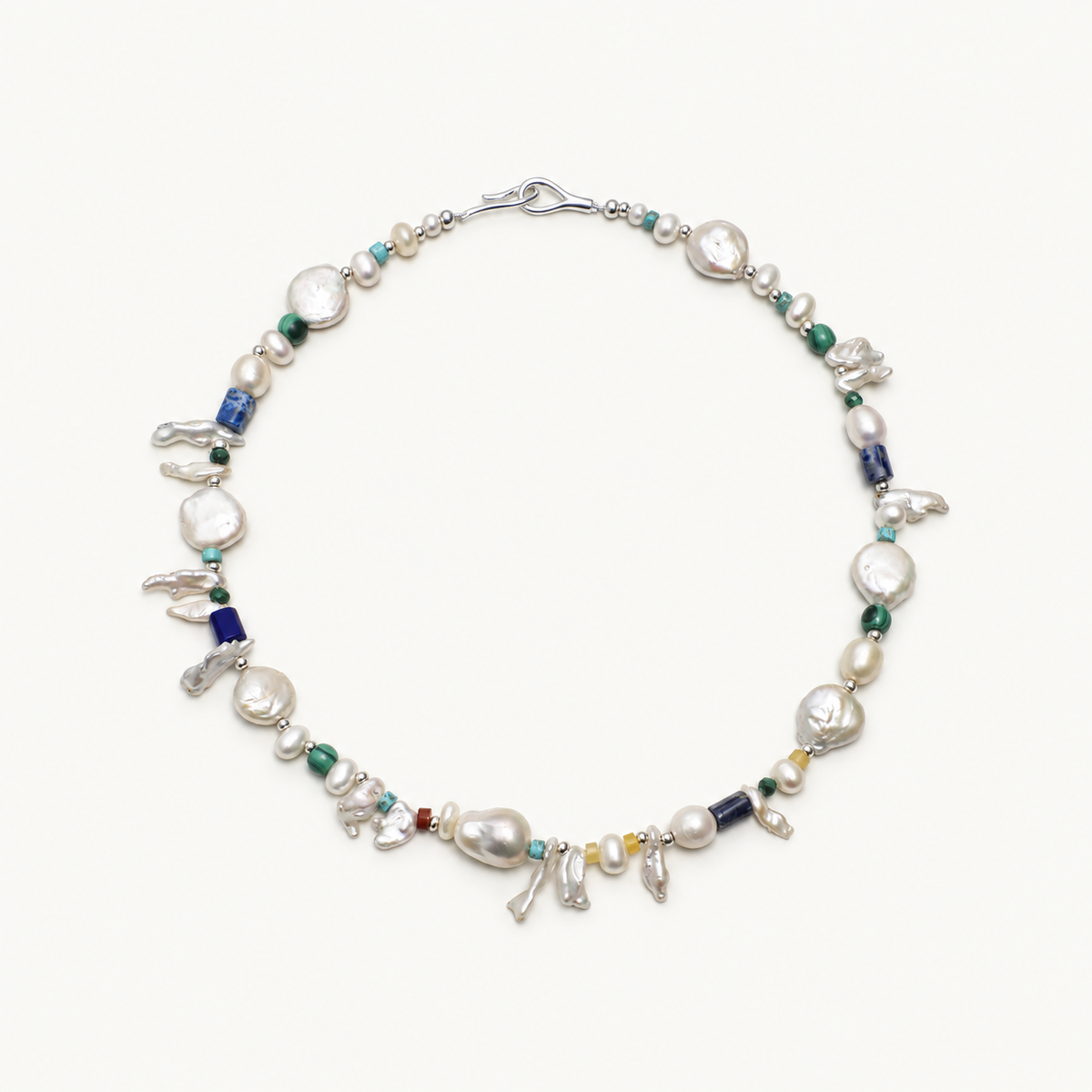 Forest Isle — Silver Rhythm Necklace on ivory background