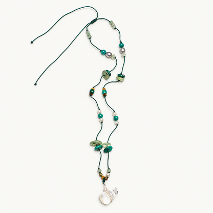 Clear Stream — Crystal Drift Necklace on ivory background